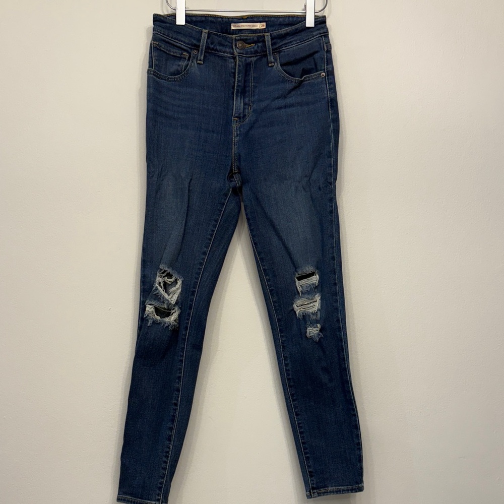 Levi’s Classic Blue Skinny Jeans with Distressed Details